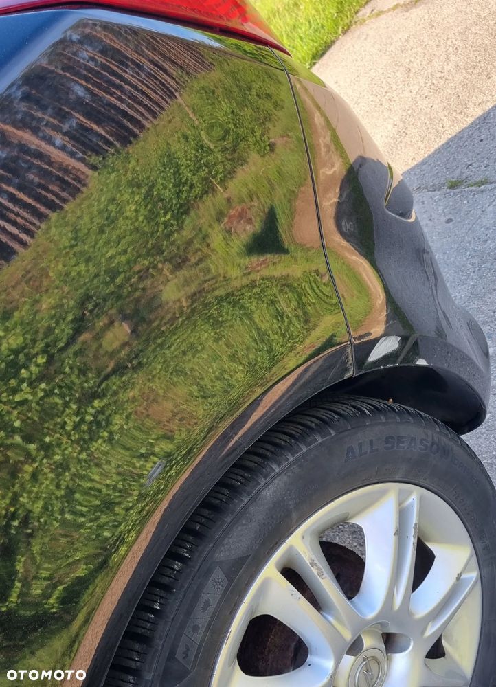 Opel Corsa 1.2 16V Essentia - 9