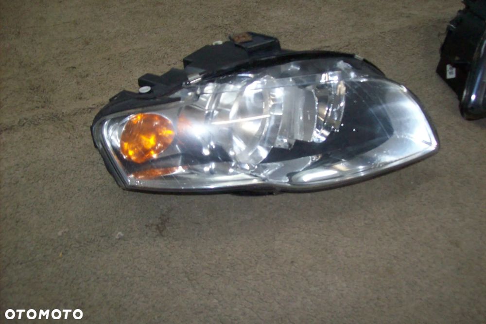 LAMPA PRZEDNIA PRAWA AUDI A4 B7 EUROPA - 2