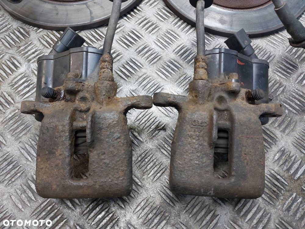 TARCZE HAMULCOWE TYŁ + ZACISKI AUDI A6 C6 - 2