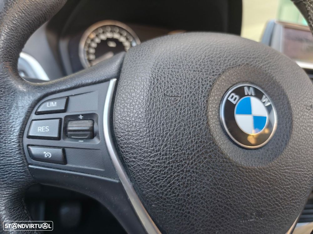 BMW 116 i Advantage — fotografia 22