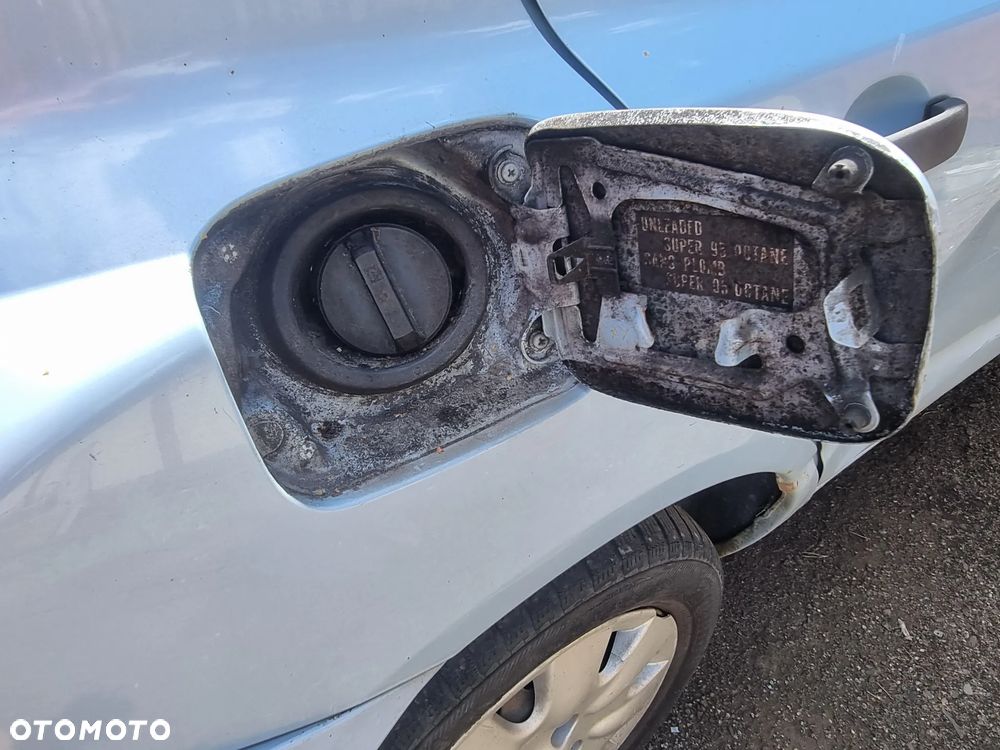 NISSAN MICRA III K12 03-07 2005 r. 5D HB B32 klapka wlewu paliwa * - 2