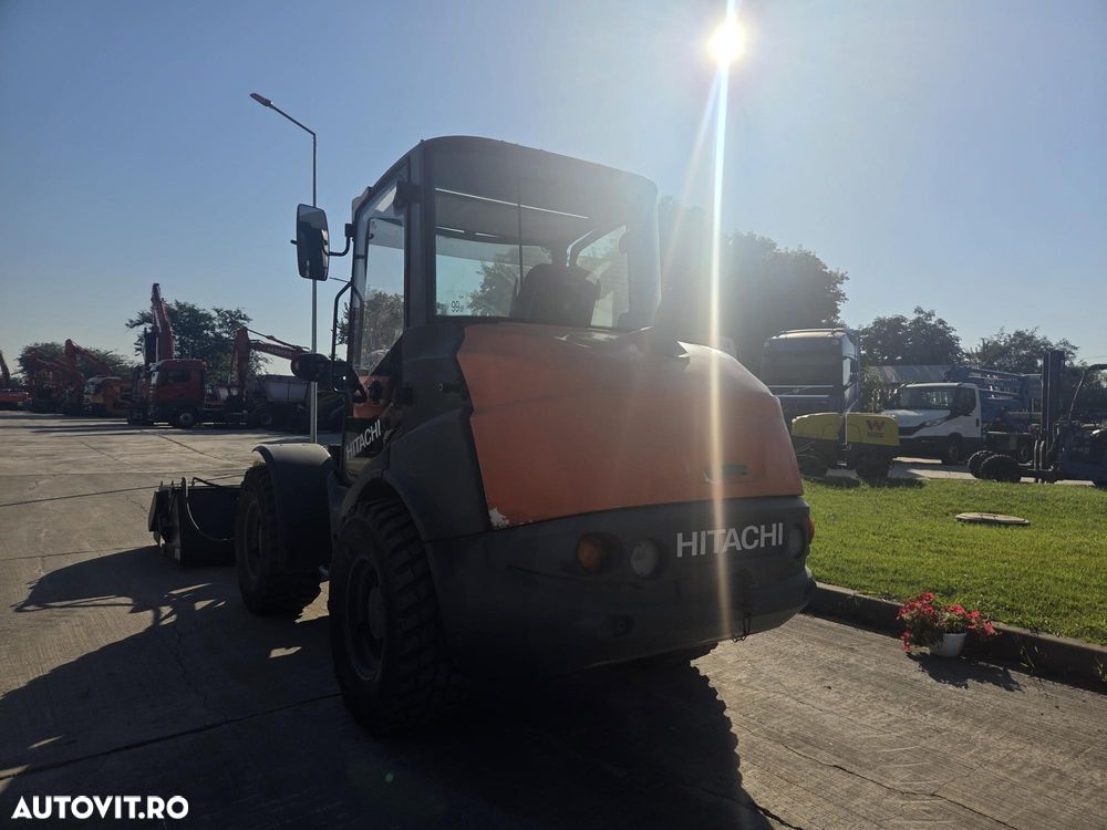 Hitachi ZW75-6, 2019, 2.745h, CUPA MULTIFUNCTIONALA 1mc, FURCI, CUPLA RAPIDA, ridica 2,4 tone la 3,2m, incarca 8x4 si  sem basculabila, Masa operationala 5tone, Anv 80% ok, motor 75CP, produs in Germania, posibilitate leasing 3 ani-PROMOTIE 29.900 EUR+Tva - 2