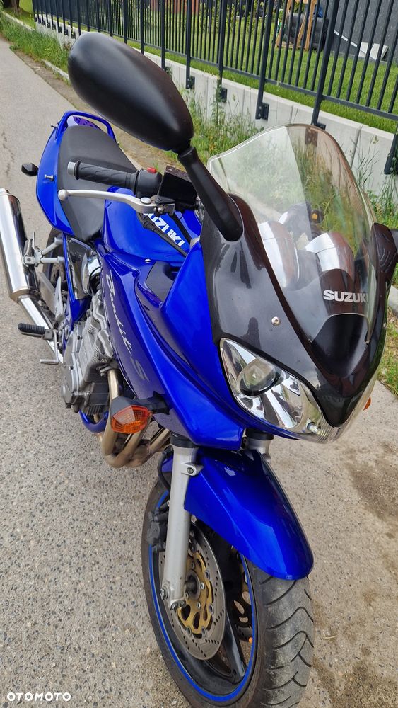 Suzuki Bandit GSF 600 S wszystkie części: lampa,rama,kierownica,owiewka,zaciski hamulcowe,alternator,tarcze hamulcowe, kolektor wydechowy. - 19