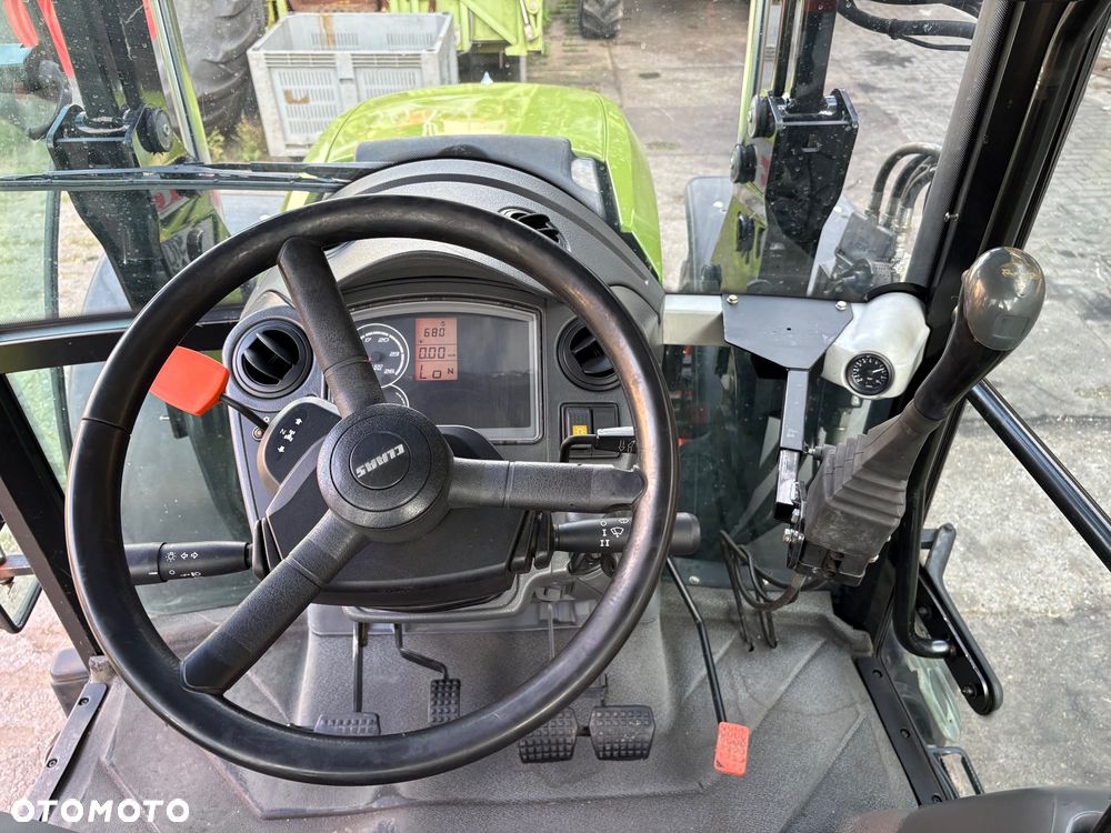 Claas Axos 310 + ładowacz - 9