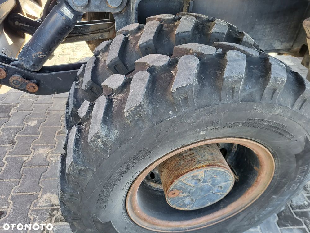 Caterpillar M 318F / z Niemiec /  9300 mth / - 12