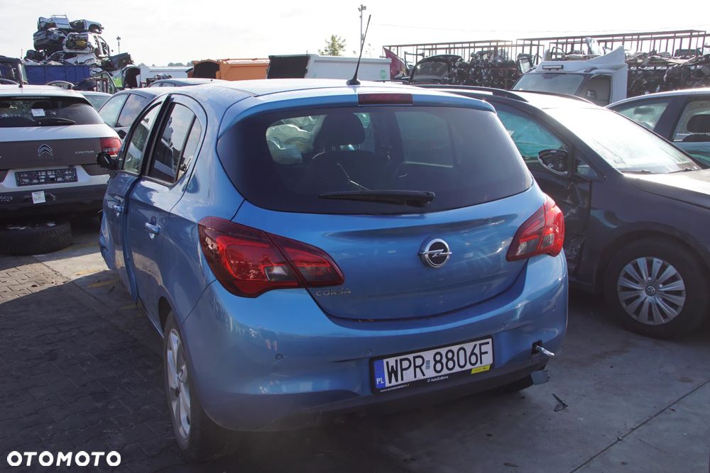 Auto na części - Opel Corsa E 1.4 Twinport 90 KM B14XEL F17 Z22V 2018R Silnik Skrzynia Drzwi Błotnik Zderzak Klapa Lampa Lusterko Klamka Szyba Deska Kokpit Sterownik Moduł Czujnik Licznik Panel Kierownica - 6
