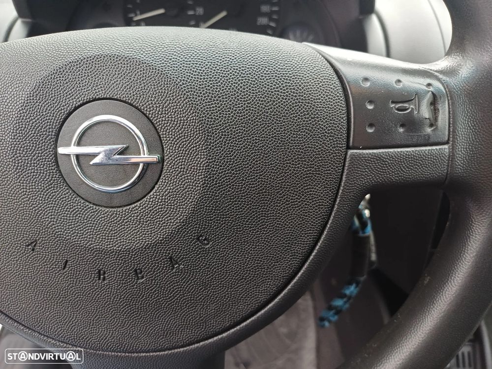 Opel COMBO 1.3 CDTI 75 CV - AR CONDICIONADO - 25