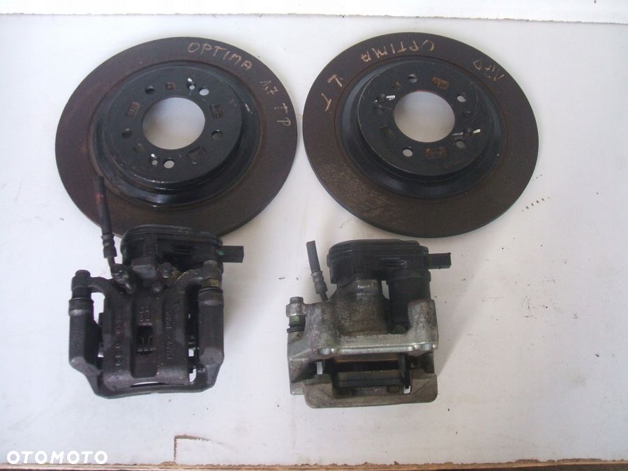 OPTIMA IV ZACISK HAMULCOWY tył lewy prawy tarcza