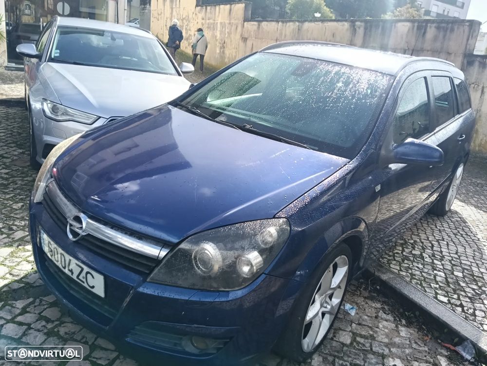 Opel Astra Caravan 1.9 CDTi Cosmo - 27