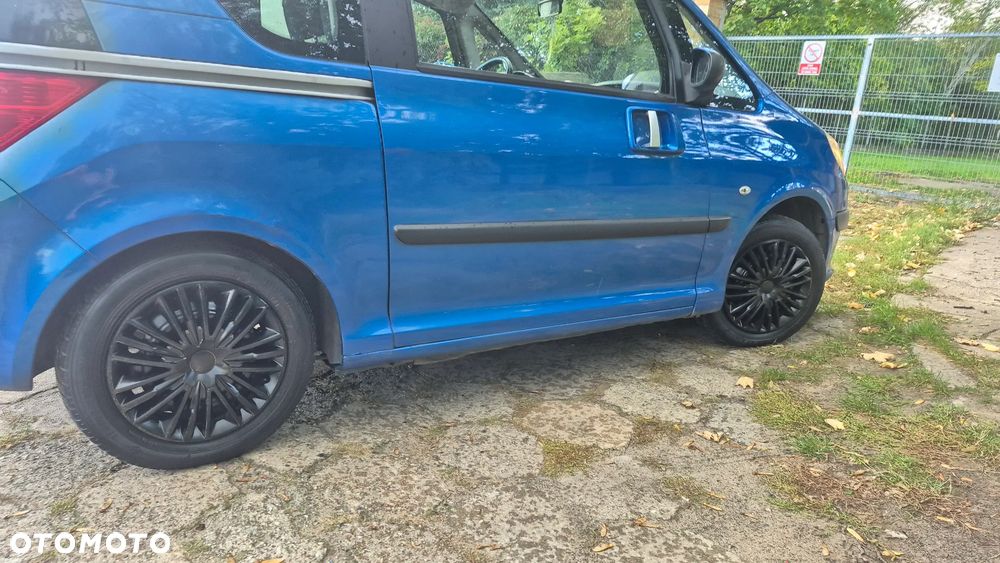 Peugeot 1007 1.4 HDI Trendy - 12
