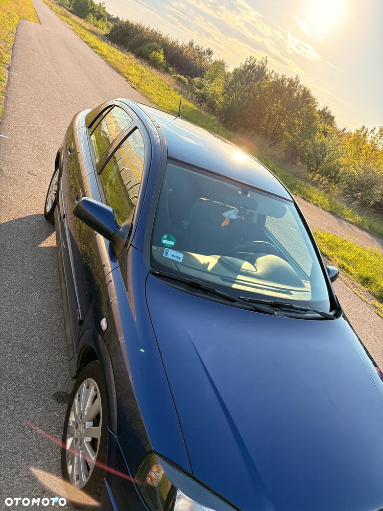 Opel Astra 1.8 Sport - 11
