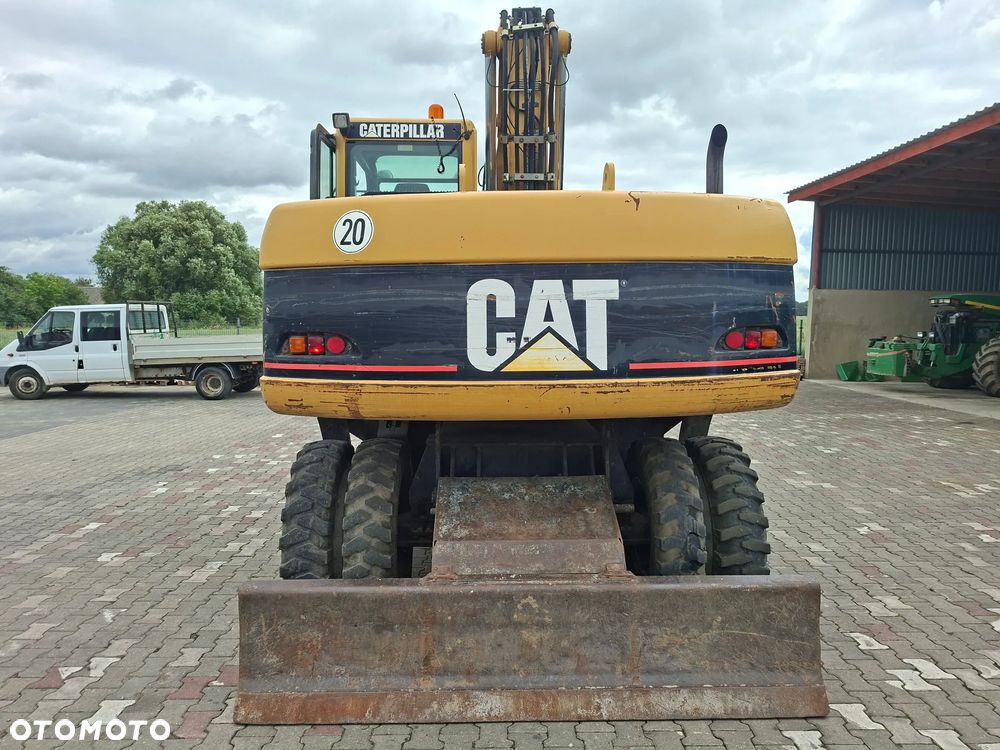 Caterpillar M316C - 6