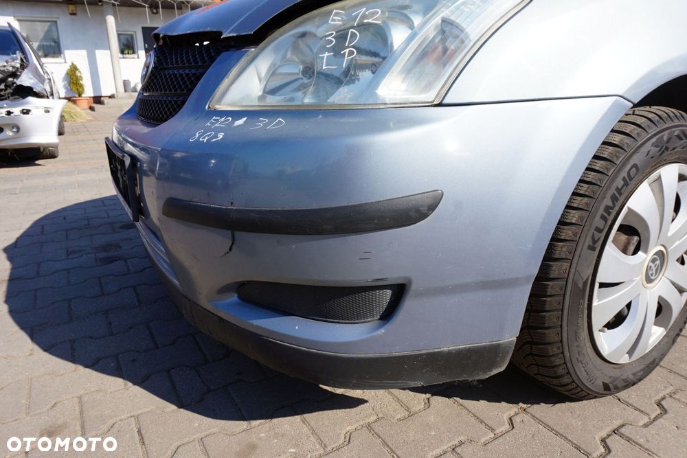 MASKA ZDERZAK BŁOTNIKI LAMPY COROLLA E12 8Q3  TOYOTA 2001-2004 SREBRNY PRZÓD KOMPLETNY - 8