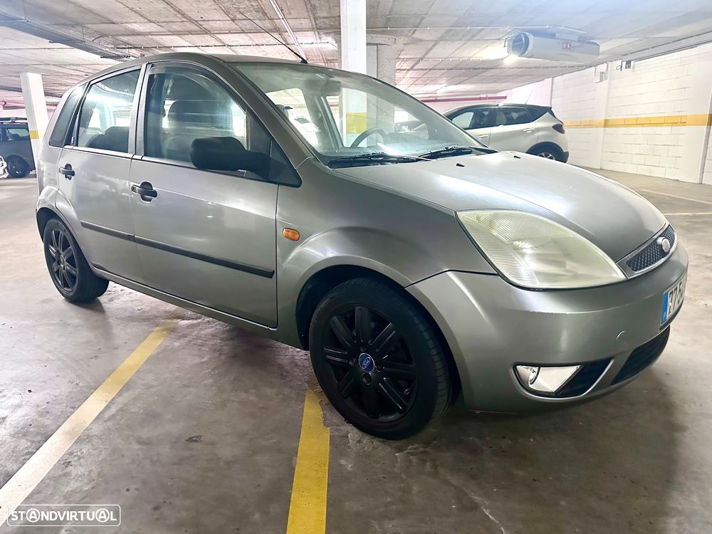 Ford Fiesta 1.4 Ghia - 11