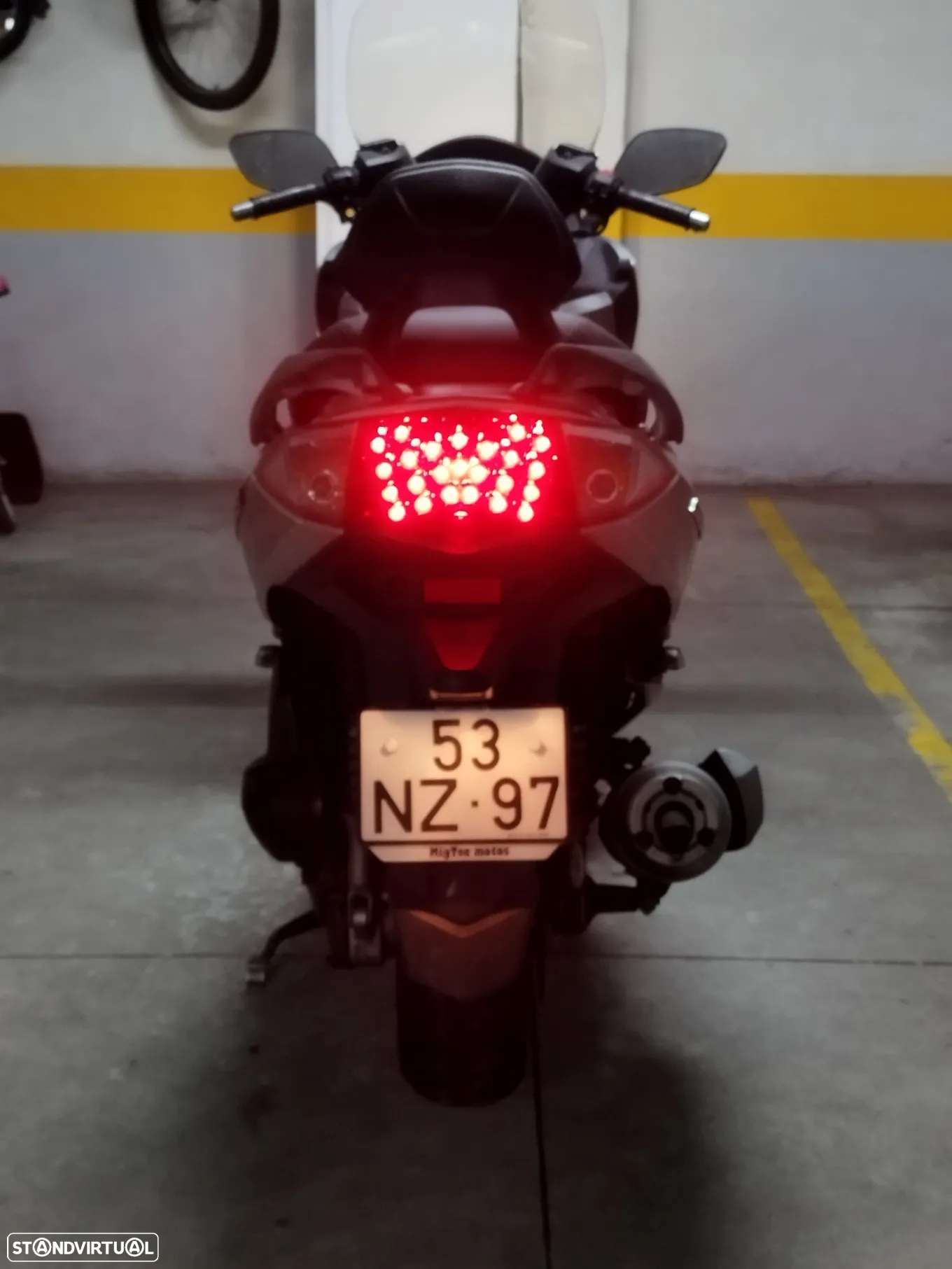 Sym GTS - 4