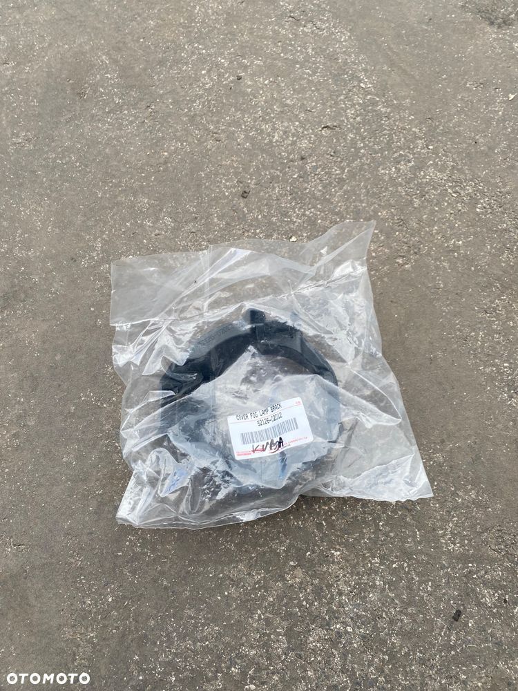 TOYOTA AURIS1 I lift Nowa ! Oryginalna ! lewa ramka lewe mocowanie koszyczek koszyk halogenu na pod halogen wspornik lewy przedni przód  52126-02012  5212602012 - 2