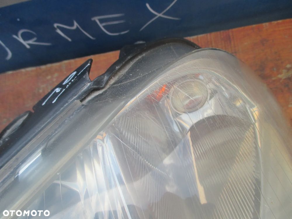 Lampa lewa VW PASSAT B5 LIFT HELLA EUROPA - 4