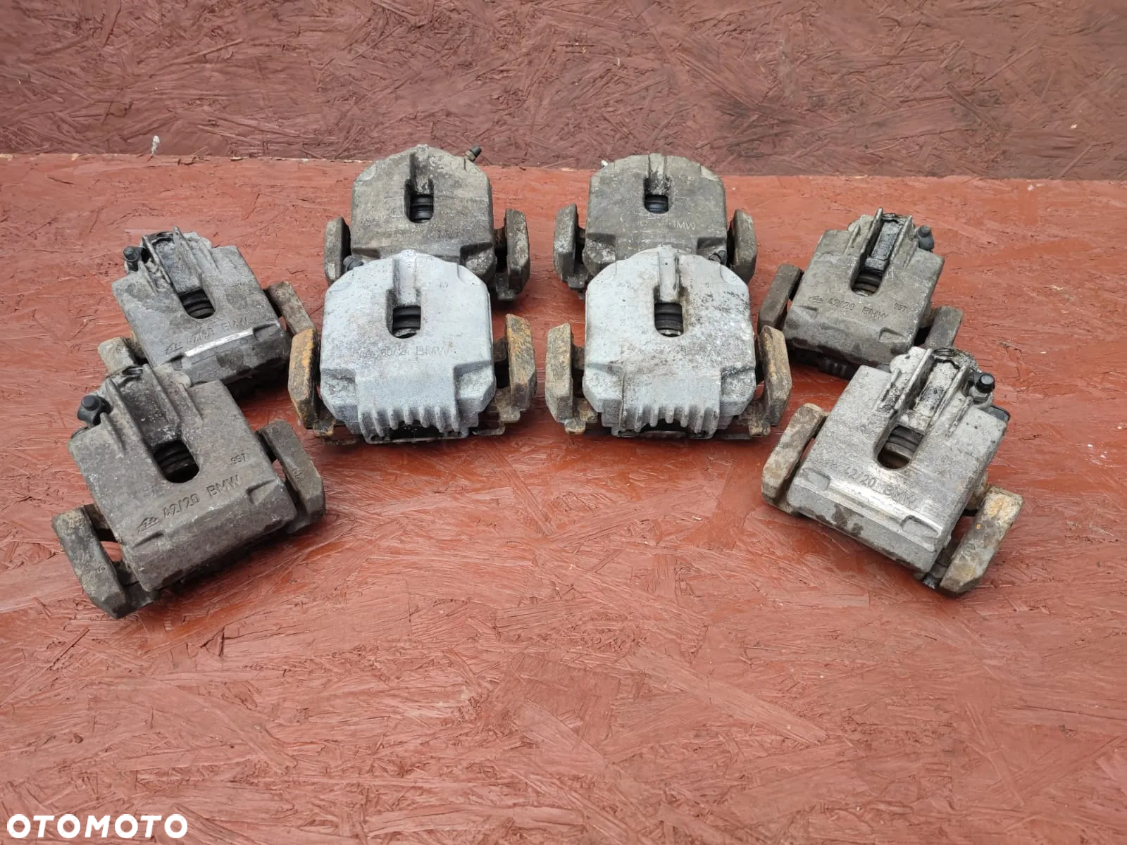 BMW E60 / E60 LCI / E61 / E61 LCI / E63 / E63 LCI / E64 / E64 LCI / E65 / E66. ORYGINALNE ZACISKI HAMULCOWE + JARZMA DO SILNIKÓW GAMY M57D25 / M47D20 / M54B22 / M54B25 POD TARCZĘ HAMULCOWĄ PRZÓD 310MM / TYŁ 320MM. O NR: 6 753 659 / 6 753 660 / 6 765 909 / 6 765 910 OEM. SPRAWNE W 100%. - 3