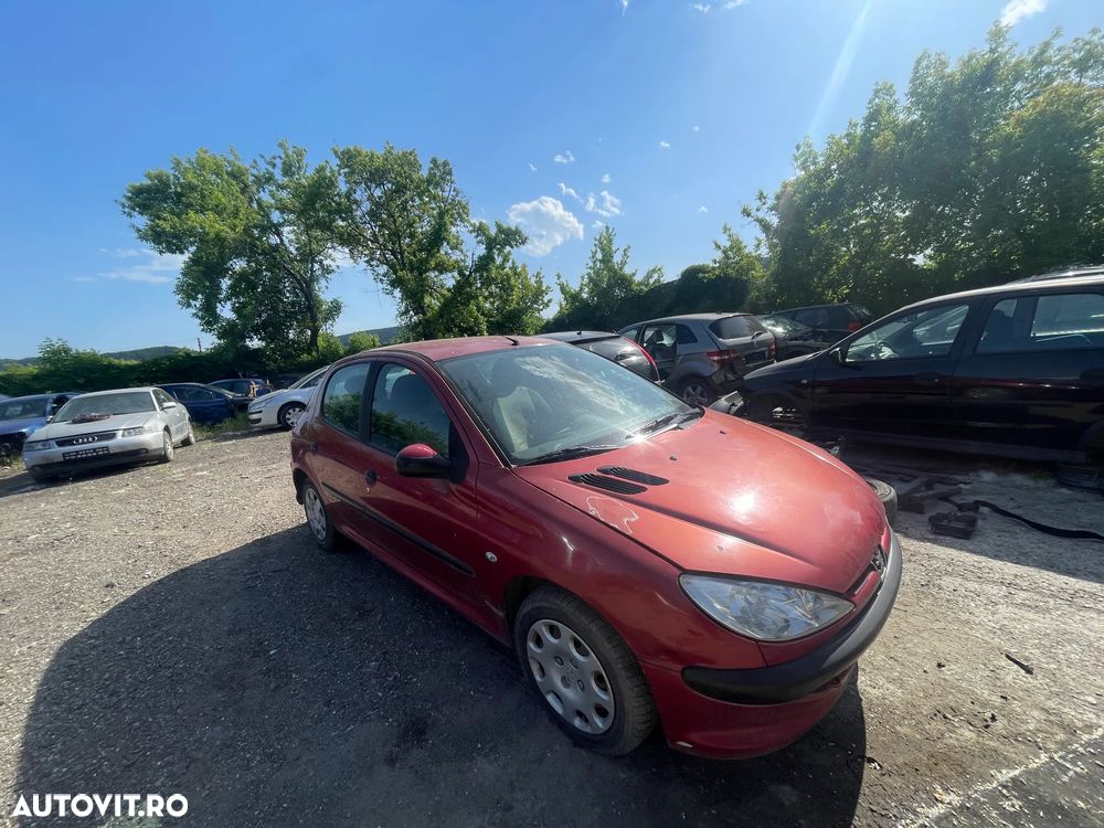 Dezmembrez Peugeot 206 1.4 KFV 55kW 75Cp Facelift rosu an 2006 - 1