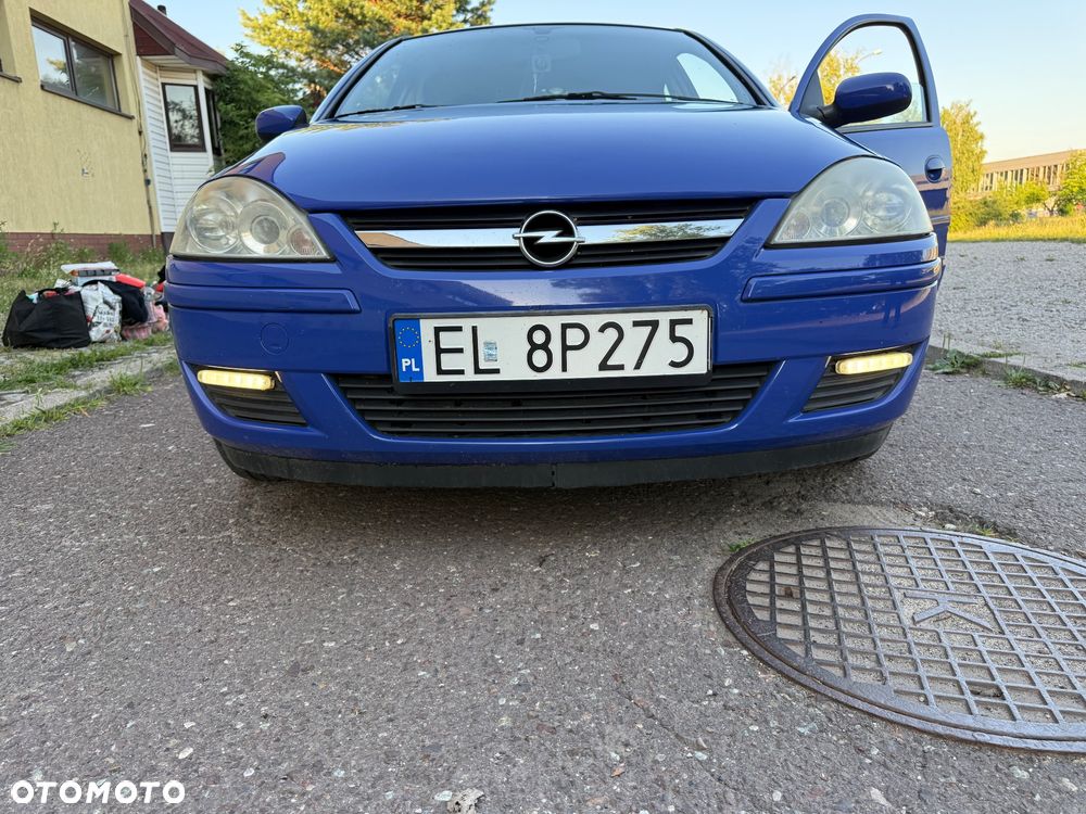 Opel Corsa 1.0 12V Cosmo - 8