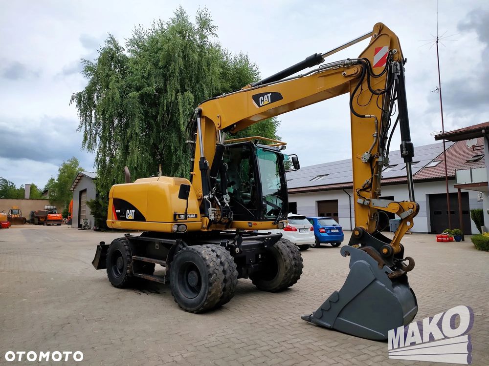 Caterpillar M313D - 6