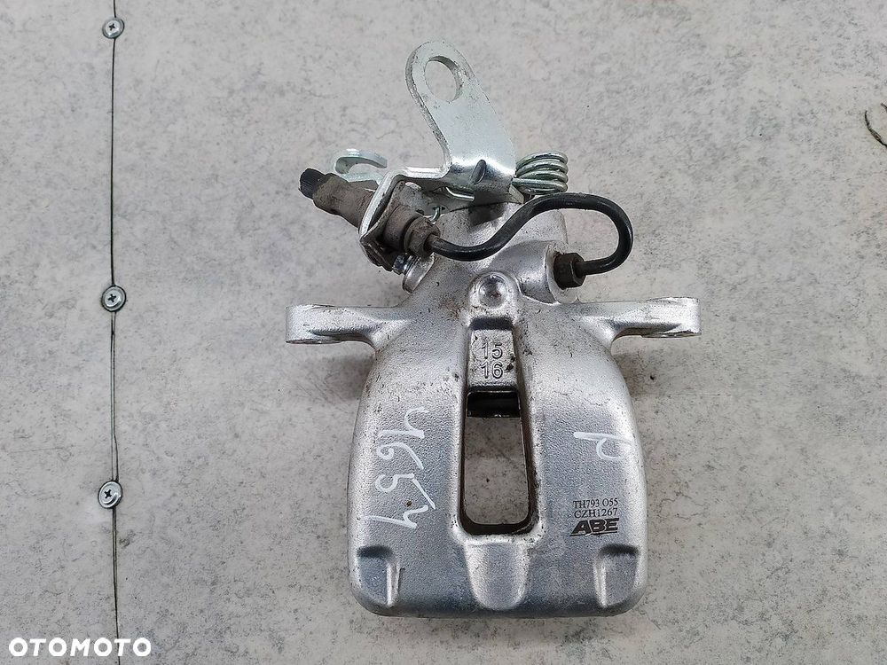 ZACISK HAMULCOWY PRAWY TYŁ VW GOLF V TH793 CZH1267 ABE 1.4 TSI - 1