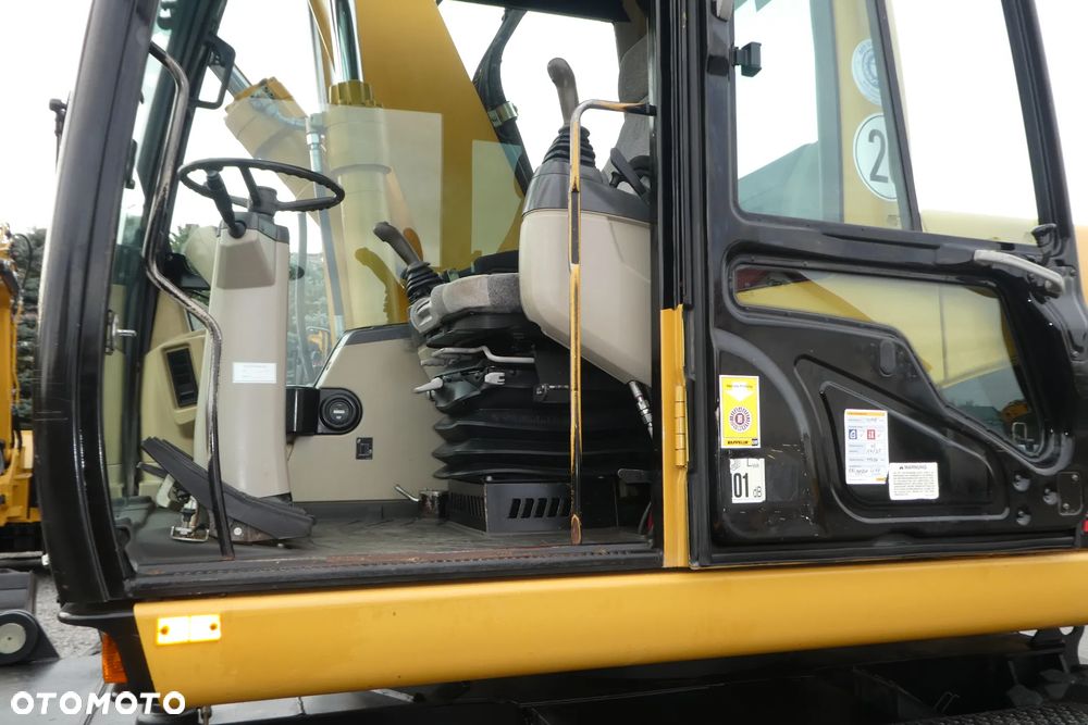 Caterpillar M315C Z NIEMIEC TRZY ŁYZKI - 22