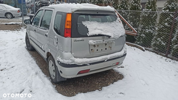 Suzuki Ignis 03- 1.3 B  Z2s Części blacharskie mechaniczne