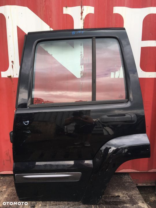 B195 Jeep GRAND CHEROKEE lewe TYLNE DRZWI Z SZYBĄ - 1
