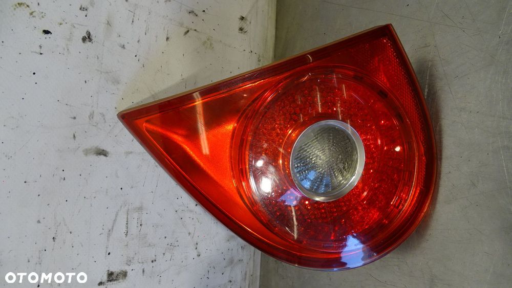 LAMPA PRAWA TYLNA W KLAPIE VOLKSWAGEN GOLF V 1.9TDI 1K6945094G - 6