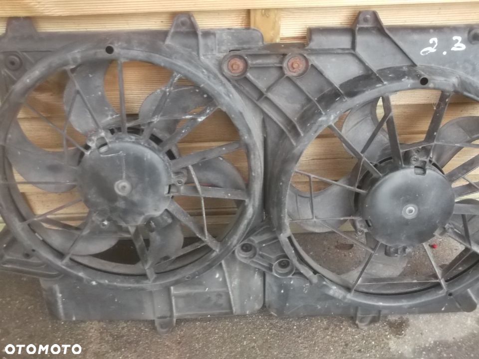 MAZDA TRIBUTE 2,3 150KM WENTYLATORY CHLODNICY komplet oryginal - 3