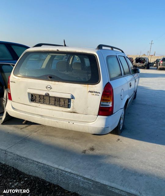 Broasca usa fata stanga Opel Astra G  [din 1998 pana  2009] seria wagon 5-usi 1.7 DTi MT (75 hp) - 4