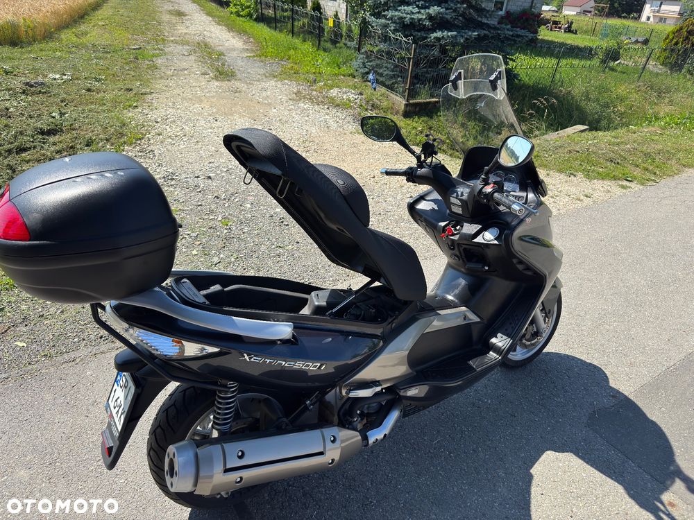 Kymco Xciting - 18