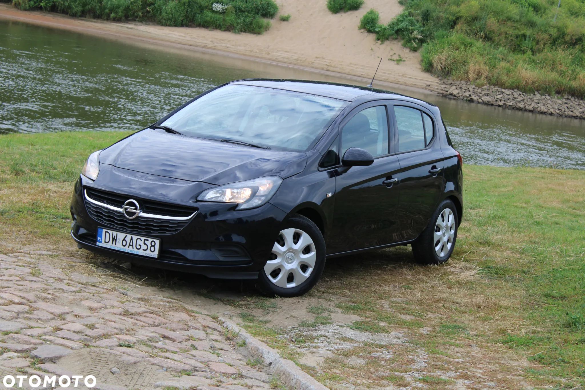Opel Corsa 1.4 Enjoy - 1