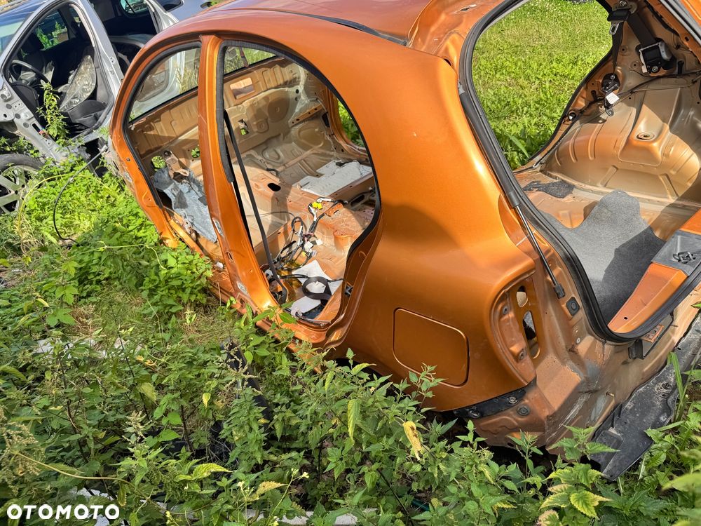 NISSAN MICRA K13 BŁOTNIK ĆWIARTKA TYL PRAWA LEWA PRÓG TYLNY PAS PODŁOGA BAGAŻNIKA