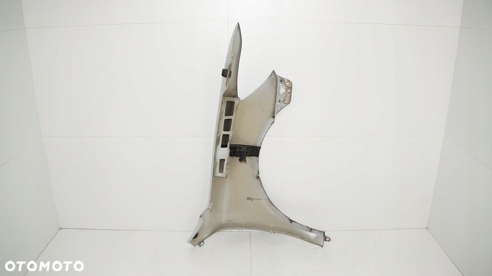 BŁOTNIK LEWY PRZÓD SKODA OCTAVIA II LIFT 08-13R LA7W - 10