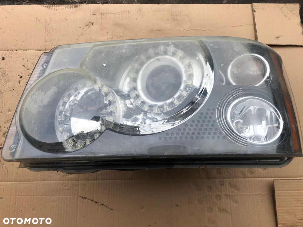 Lampa przednia lewa xenon RHD anglik XBC501773 Range Rover Sport L320 2005-09 - 1