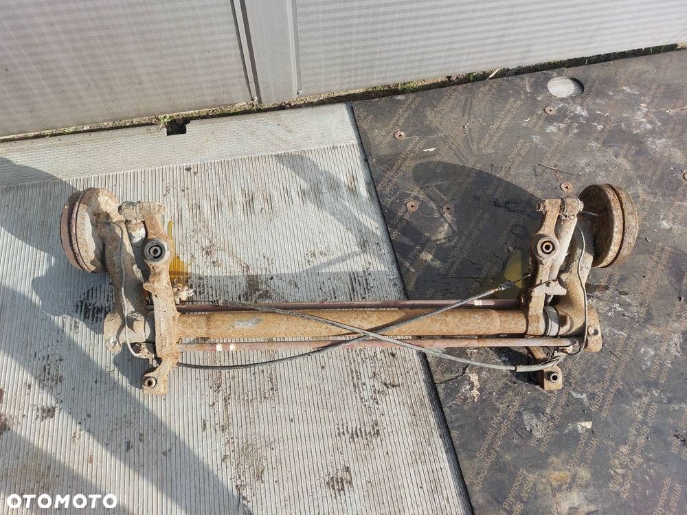 BELKA OŚ ZAWIESZENIA TYŁ BĘBNY PEUGEOT 106 I LIFT 96-03r 4-SZPILKI - 4