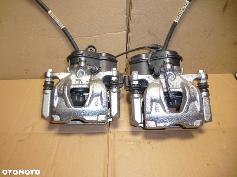 ZACISK HAMULCOWY TYŁ LEWY LUB PRAWY AUDI A4 B9 8W NOWY!!! - 1