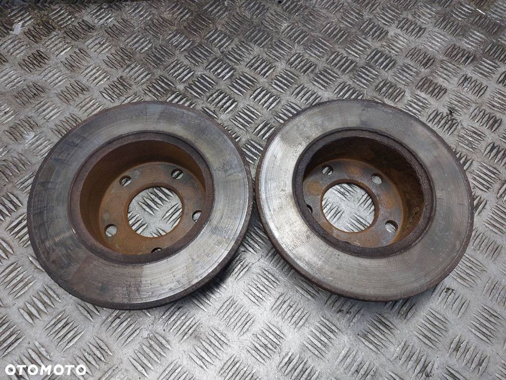 TARCZE HAMULCOWE TYŁ + ZACISKI VOLKSWAGEN PASSAT B5 - 5