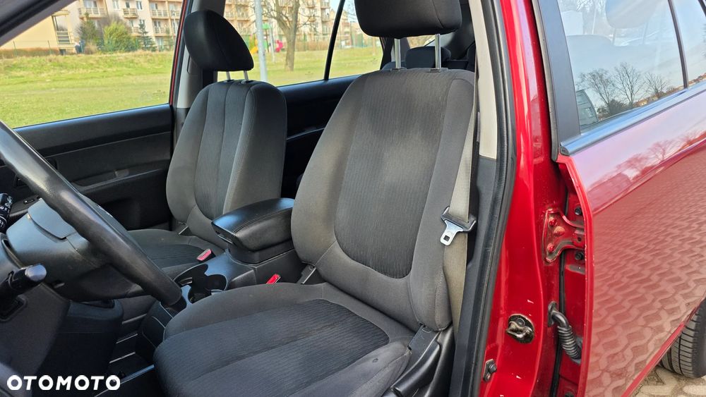 Kia Carens 2.0 CVVT EX Top - 19