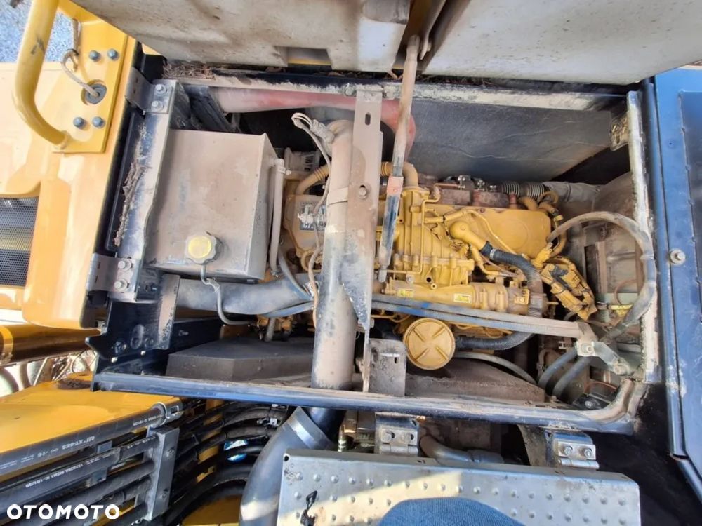 Caterpillar M318F - 12