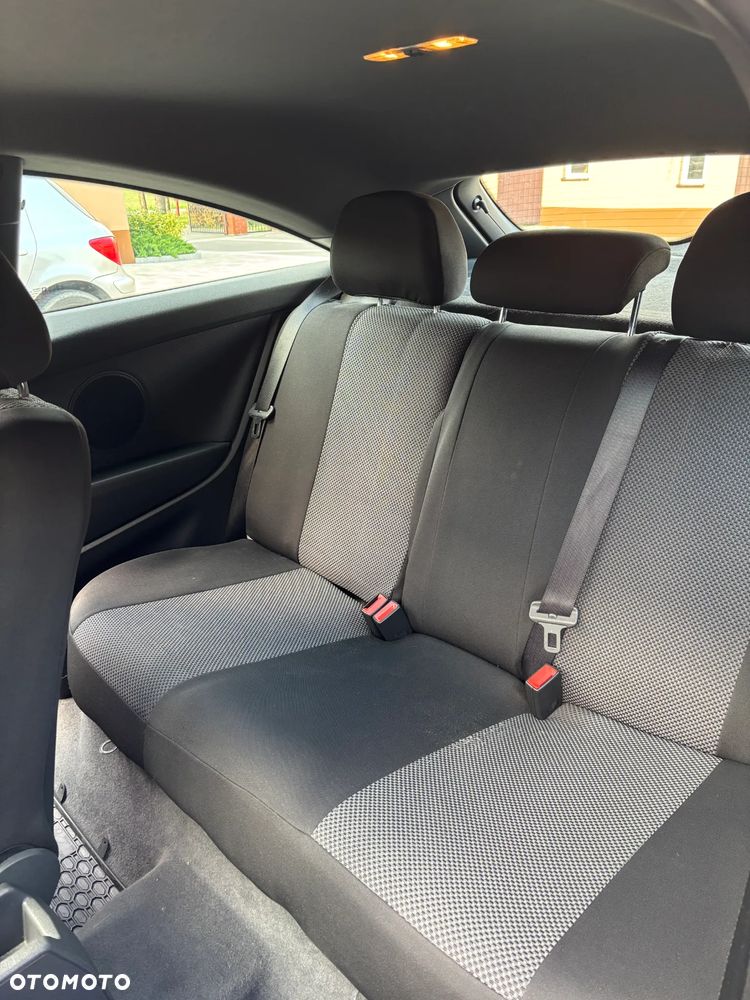 Opel Astra 1.8 Cosmo - 12