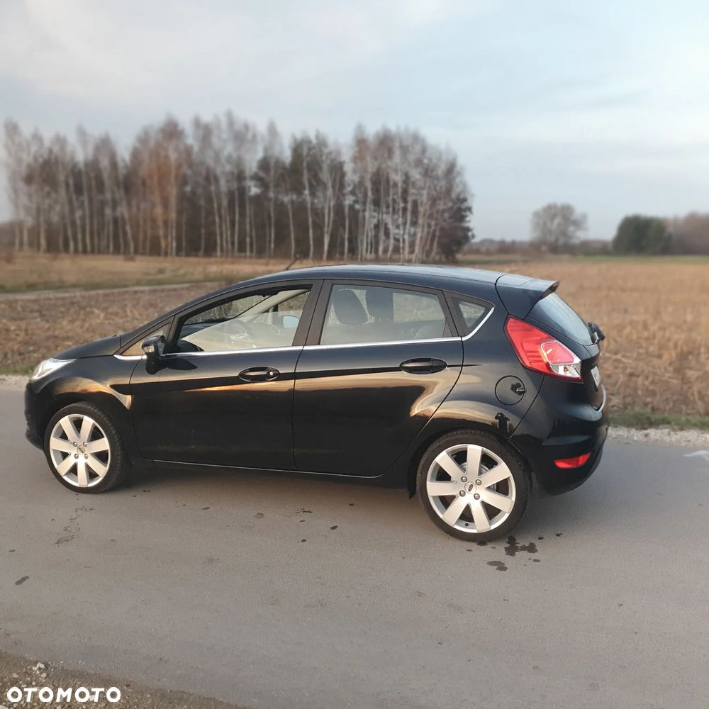 Ford Fiesta 1.25 Ghia - 11