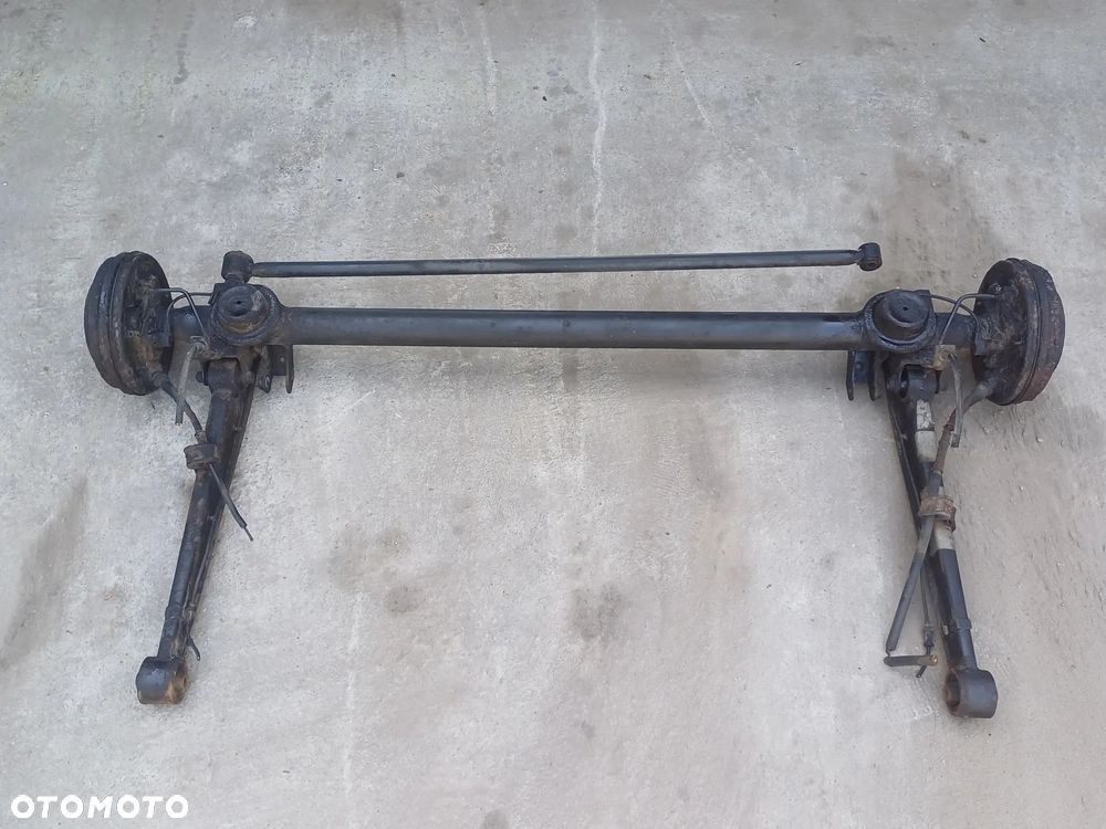 BELKA TYLNA OŚ SUZUKI IGNIS 03-08 BĘBNY LIFT