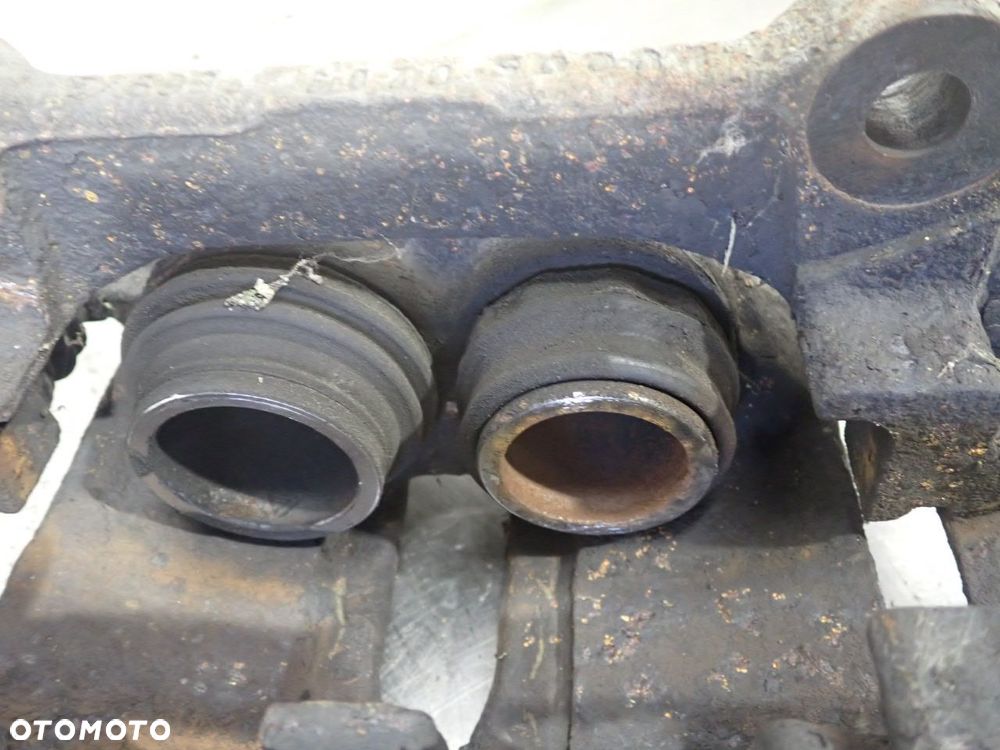 ZACISK HAMULCA PRAWY PRZÓD RENAULT TRAFIC II 1.9 - 5