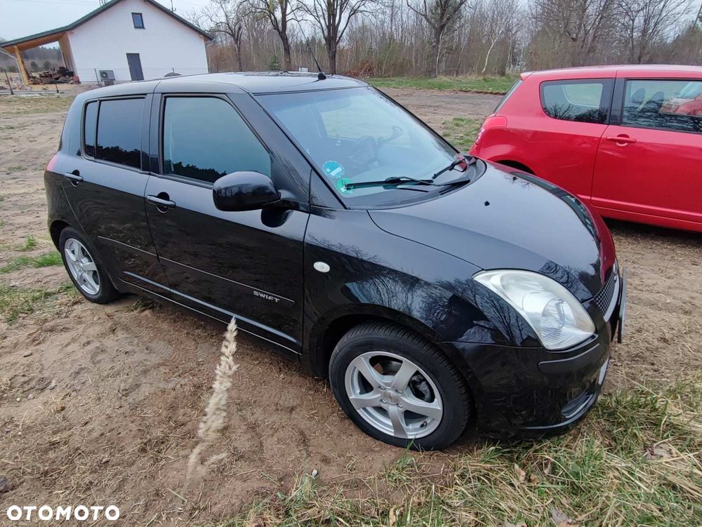 Suzuki Swift 1.3 Club - 8