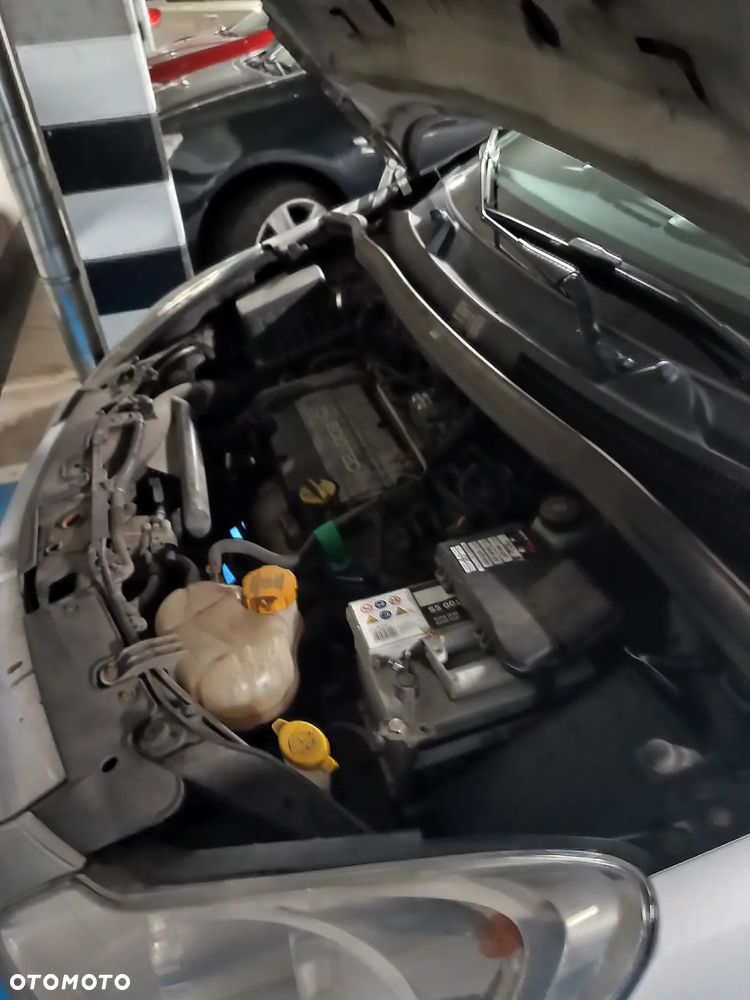 Opel Corsa 1.2 16V Enjoy - 21