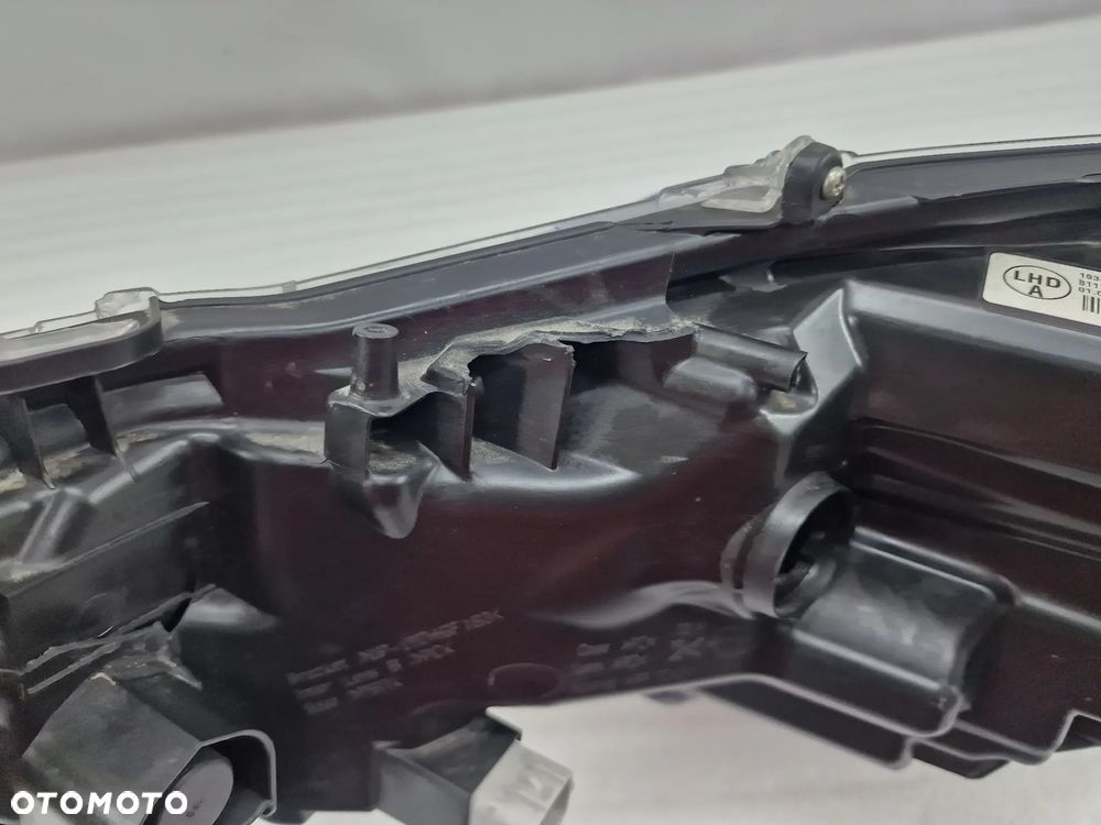 TOYOTA COROLLA E21 18- LEWA / PRAWA ZWYKŁA LAMPA PRZEDNIA PRZÓD SOCZEWKA , NR 81110-02T31-00 / 81150-02T31 / 81150-02T31-00 , NR AUKCJI LA372 - 12