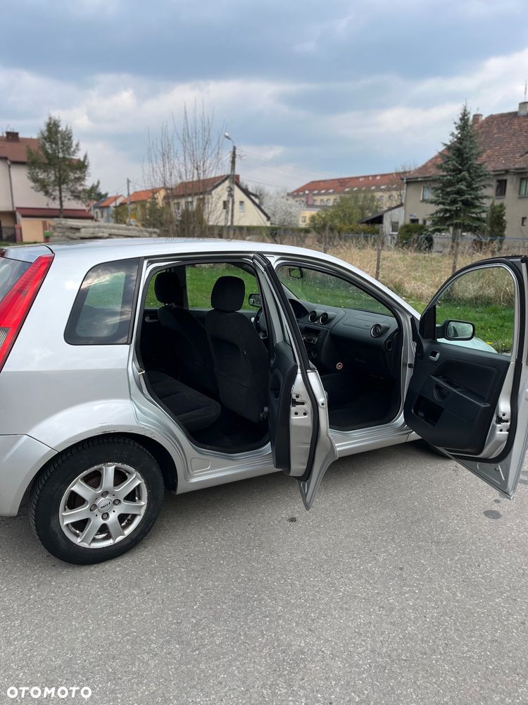 Ford Fiesta 1.4 Ghia - 12